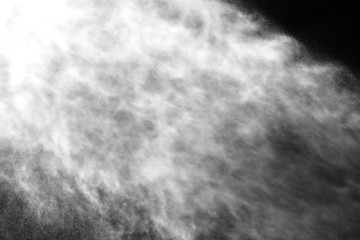 A stream of water and a cloud of drops