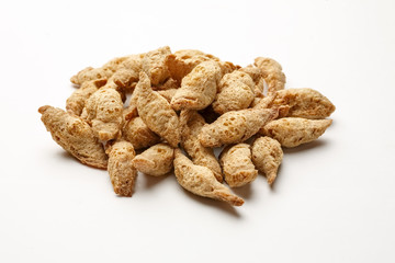 Dry soya meat chunks isolated on white