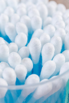 Closeup macro on ear cleaning sticks in the box. Ear hygene with ear sticks. Medical and healthcare concept image.