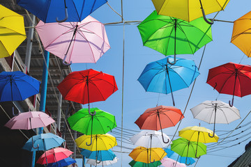 Fototapeta na wymiar colored umbrellas in the sky