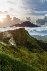 Active Indonesian volcano Batur in the tropical island Bali. Indonesia. Batur volcano sunrise serenity. Dawn sky at morning in mountain. Serenity of mountain landscape, travel concept - 260114968