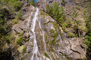 Rocky Brook Falls flows out of the Olympic National Park near Brinnon, Washington on Washington's Olympic Peninsula