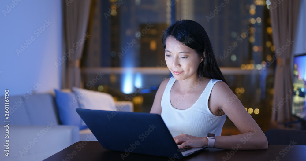 Canvas Prints Woman type on laptop computer at home