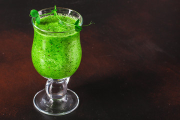 green smoothie. cocktail of vegetables and herbs - the concept of a healthy lifestyle. food background. top image