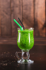 green smoothie. cocktail of vegetables and herbs - the concept of a healthy lifestyle. food background. top image