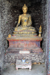Obraz premium 07 February 2019, Bangkok Thailand. Statue of a seated Buddha in the Golden temple, Srakesa temple.
