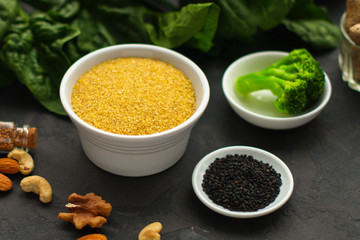 bulgur. porridge, fine grain milling and other ingredients - the concept of a healthy lifestyle. food background. top image