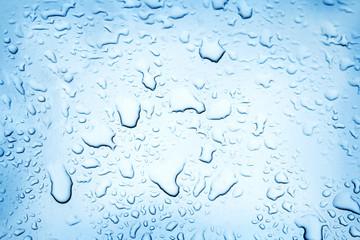 The drops of water lie on the surface.