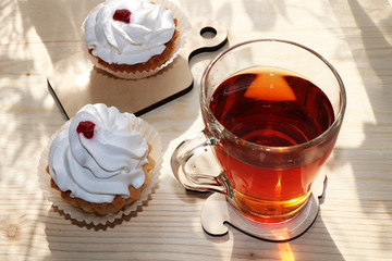 A cup of tea and cakes on a sunny table, diet food and a healthy lifestyle in the village, a beautiful morning in the village, a delicious dessert.