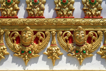 11 February 2019, Phuket, Karon beach, Thailand. Drawings on the fence of the Buddhist temple Wat Karon.