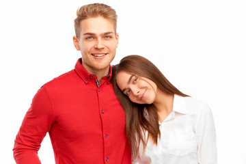 Happy young couple, beautiful girl lying on her boyfriend's shoulder. Love, tenderness, romance, relationships and happiness concept. 