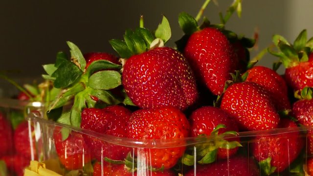 1 kg natural strawberry in package, close-up,