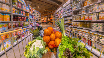 Supermarket cart with products