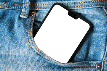 Smartphone with isolated white screen in a denim jeans pocket