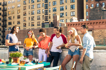 Group of friends having party on a rooftop