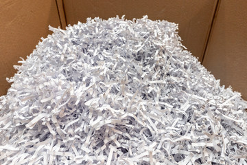 Paper recycle concept,white shredded paper documents to recycle in the cardboard box