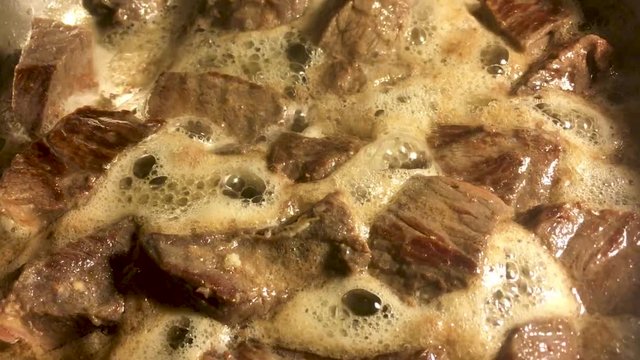 Cooking fresh meat in oil in iron utensils