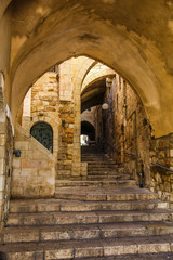 Fototapeta na wymiar Quiet Stairway within the old city of Jerusalem