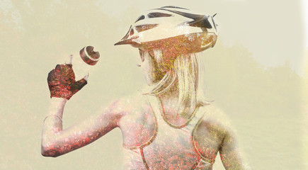 Double exposure woman cyclist. Combined with a nature. Concept Healthy lifestyle in the nature.