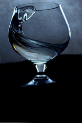 glass of water on black background