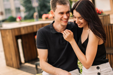 Loving couple hugging in the street.