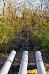 Spillway and flood barrier views of metal dike to protect from flooding by Opryland along the Shelby Bottoms Greenway and Natural Area Cumberland River, Nashville, Tennessee. United States.