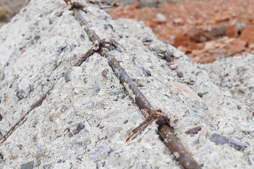 non-durable concrete, rotten concrete and rusty iron,