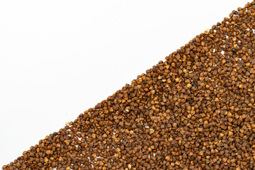 Buckwheat grain isolated on white background close up