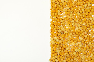 Yellow split peas isolated on white background 