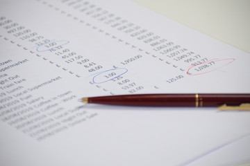 Balance sheet with pen