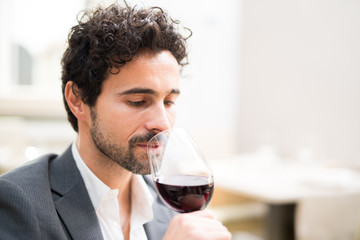 Man tasting wine