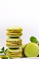 Green Pistachio Macaron Cookies Background. Selective focus.