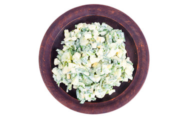 Light dietary egg salad with spring greens, yoghurt dressing.
