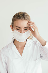 Female doctor or nurse wearing a mouth mask