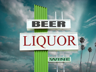 Aged and worn liquor beer and wine sign with palm trees