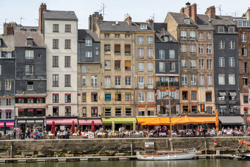 Colorful Sidewalk Cafes in Honfleur Harbor, France
