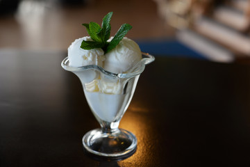 balls of dairy ice cream in a beautiful glass