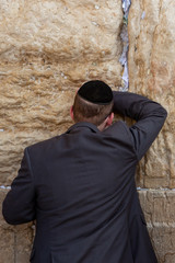 A Man Praying at the Western Wall, Jerusalem, Israel