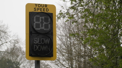 speed indicator display activated by vehicles passing and flashing your speed slow down