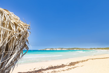Playa Macao at sunny day, sandy beach and ocean waves