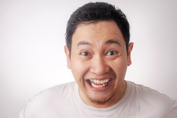 Fototapeta premium Funny Asian Man Laughing Smiling