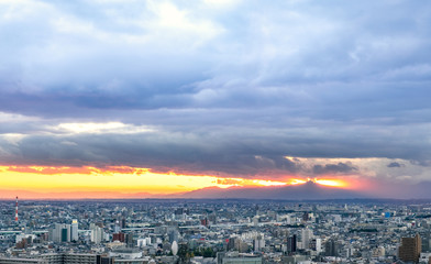 Nagoya cityscape in the evening with cloudy sky before heavy rain