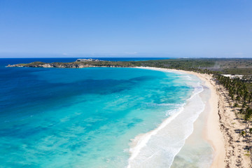 Aerial view with caribbean beach of Atlantic ocean with waves