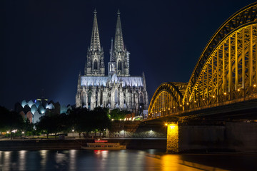 Cologne Cathedral and railway bridge over the river Rhine (Germany)