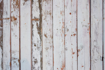 Texture of gray and olive wooden old fence boards