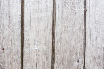 Texture of gray wooden old fence boards