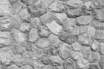Gray stone wall as a background or texture.
