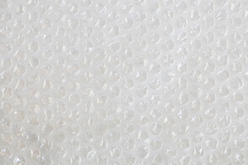 White button plastic for background.