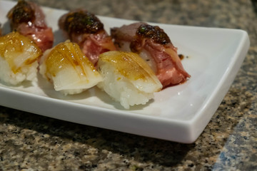 Close up of Engawa sushi.