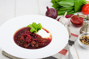 Vegetarian vegetable soup with beet without meat.